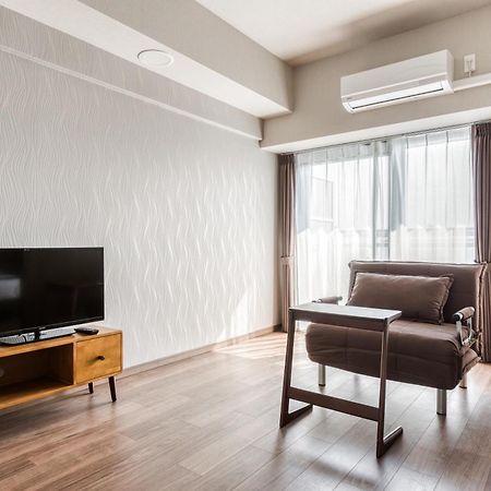Ostay Shin-Osaka Hotel Apartment Номер фото